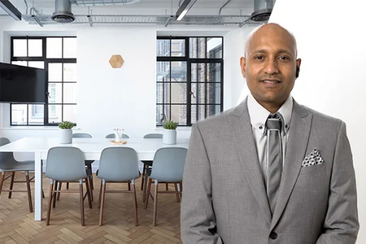 Professional office relocation team moving desks and office equipment for a York business.
